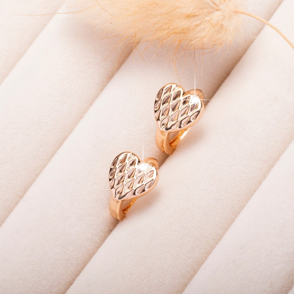 Delicate and petite openwork cross earrings